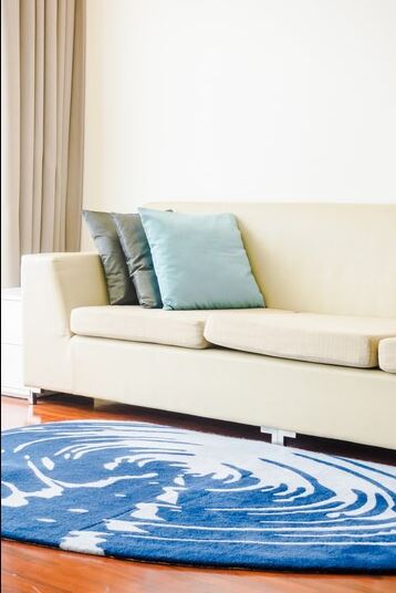 Does a smaller rug make a room look bigger or smaller? - Sarabi's Fine Rugs